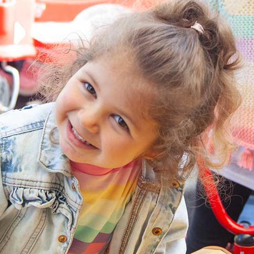 21 Young girl enjoying the outdoor area at a childcare setting